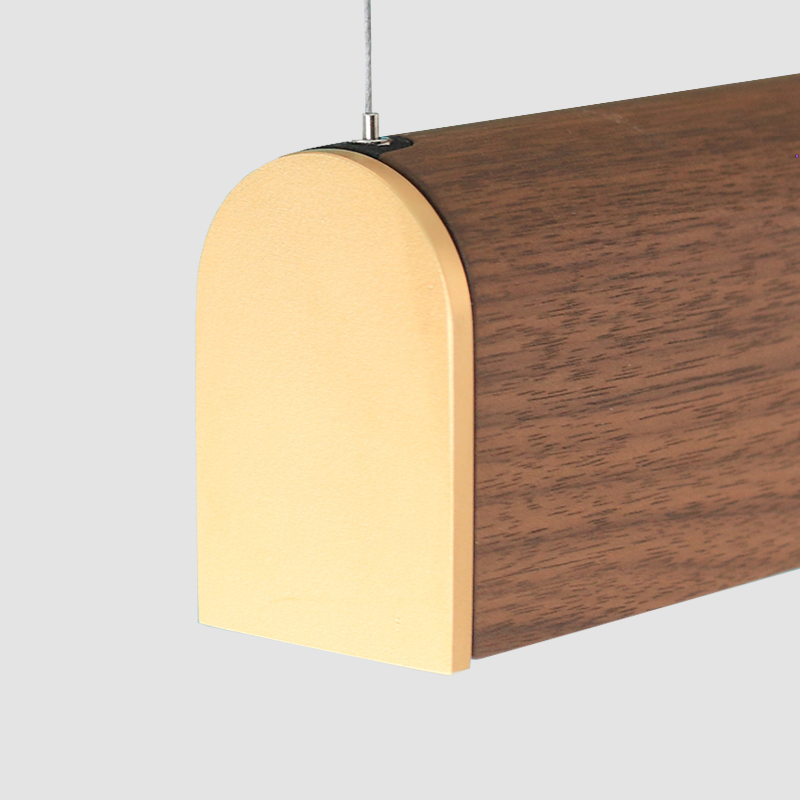 Curve by Tunto- Linear suspension light, made with organic materials and features micro prism opal diffuser