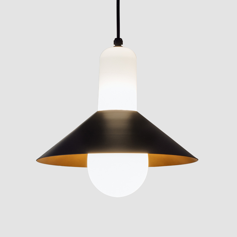 Tagomago by Milan- Pendant light with a stamped steel shade that houses an opal glass ball